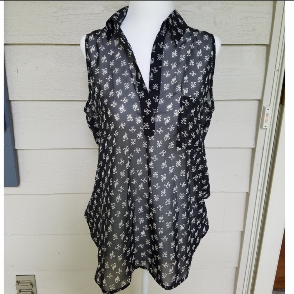Pleione blouse. Size small. Ribbon details. Sheer